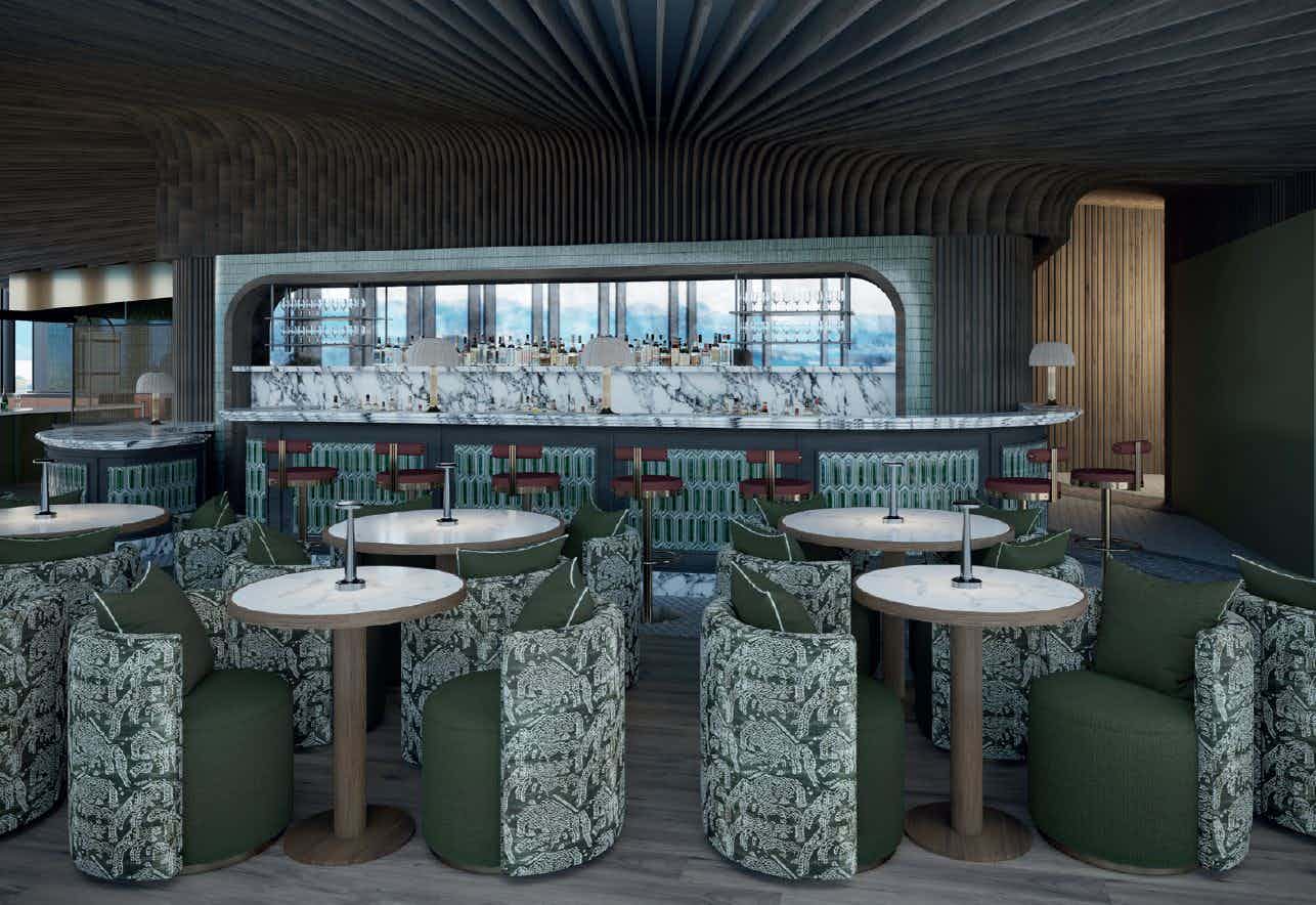 The interior of a restaurant, Seid Restaurant, on the top floor of a 16 storey building. A view of the mountains and city from large, floor to ceiling windows