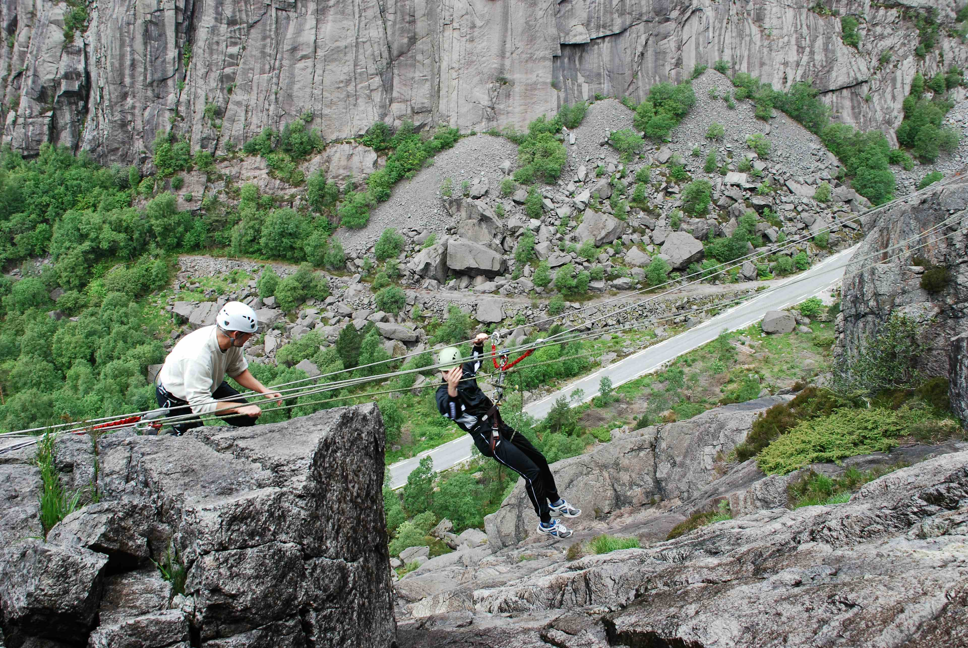 Via Ferrata Migaren with a happy climber, view of the Jøssingfjord