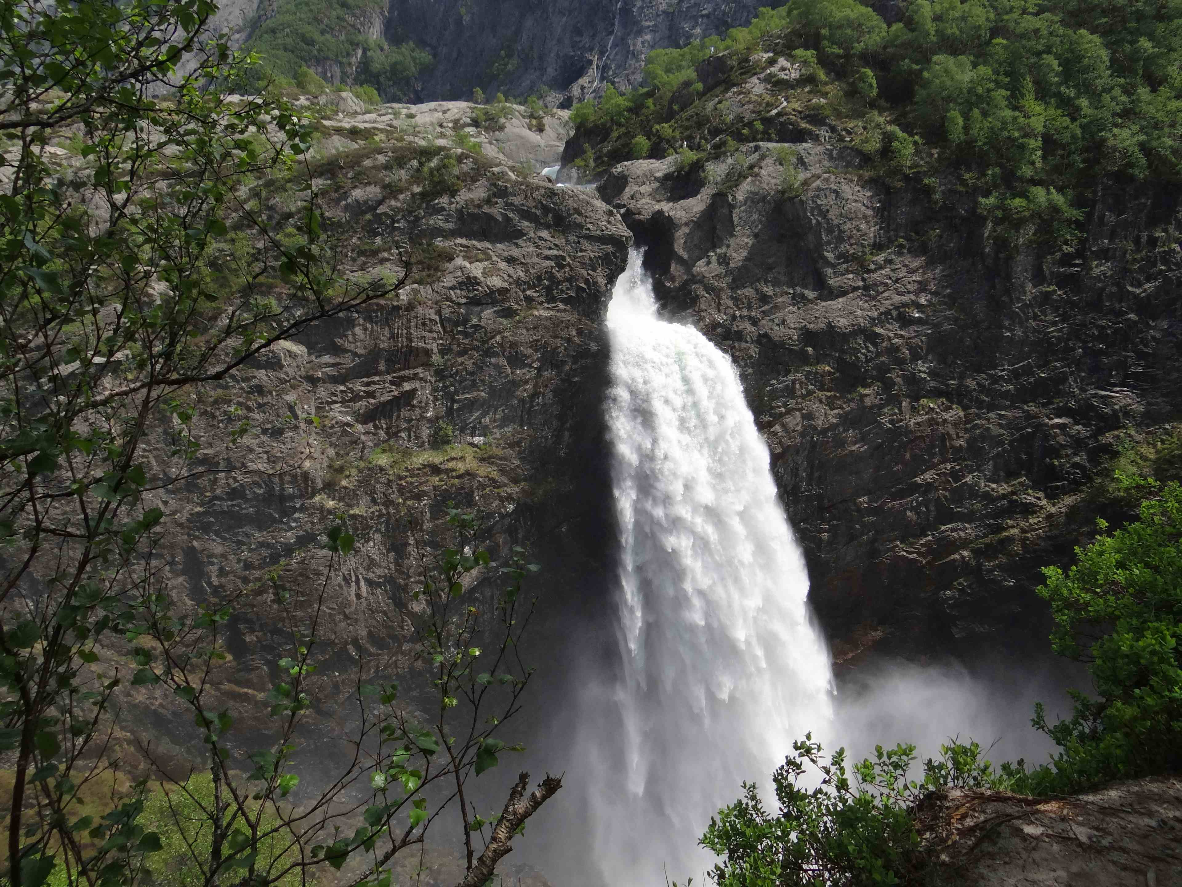 Månafossen Waterfall, viewed from viewpoint from the forest
