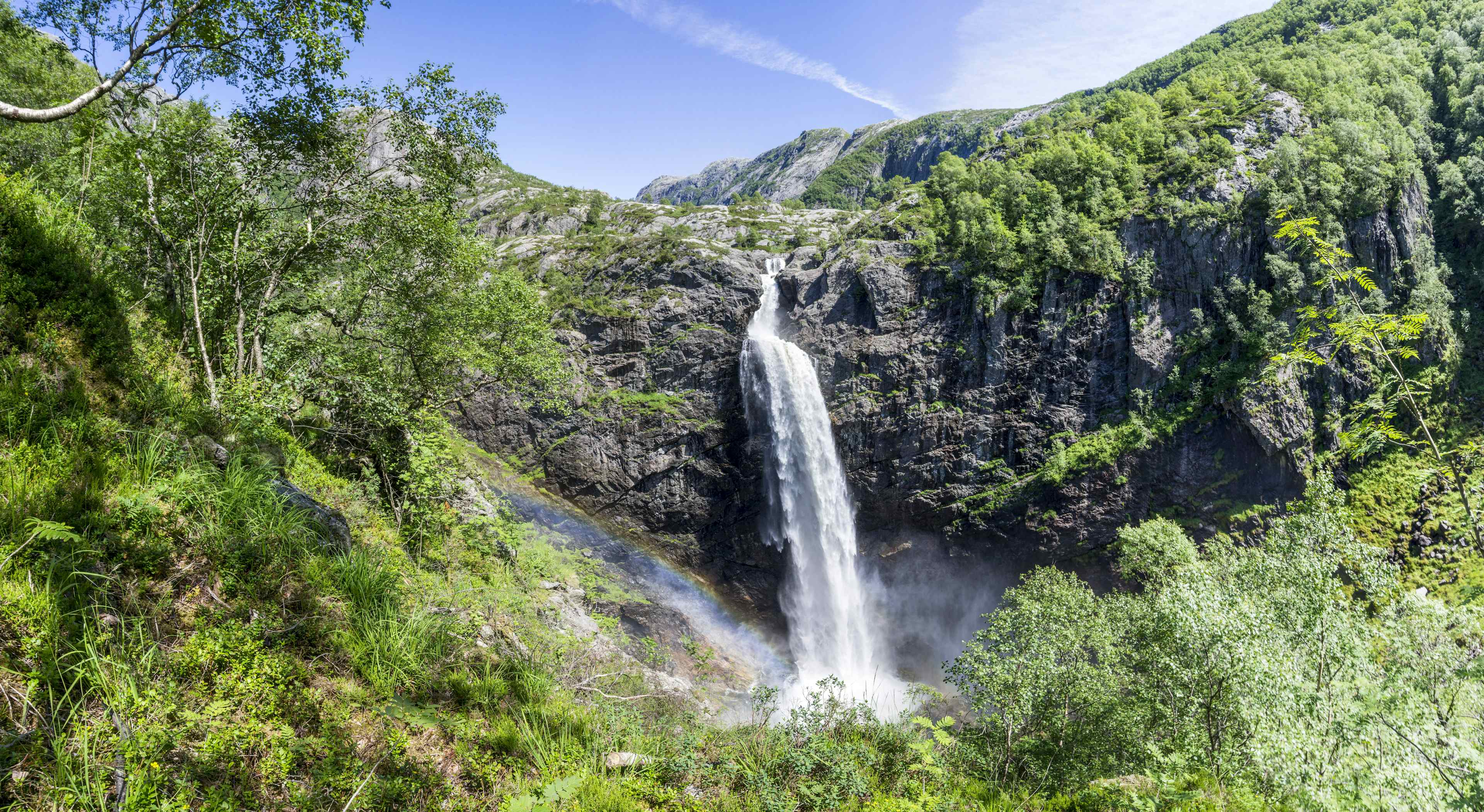 Månafossen Waterfall, viewed from viewpoint from the forest