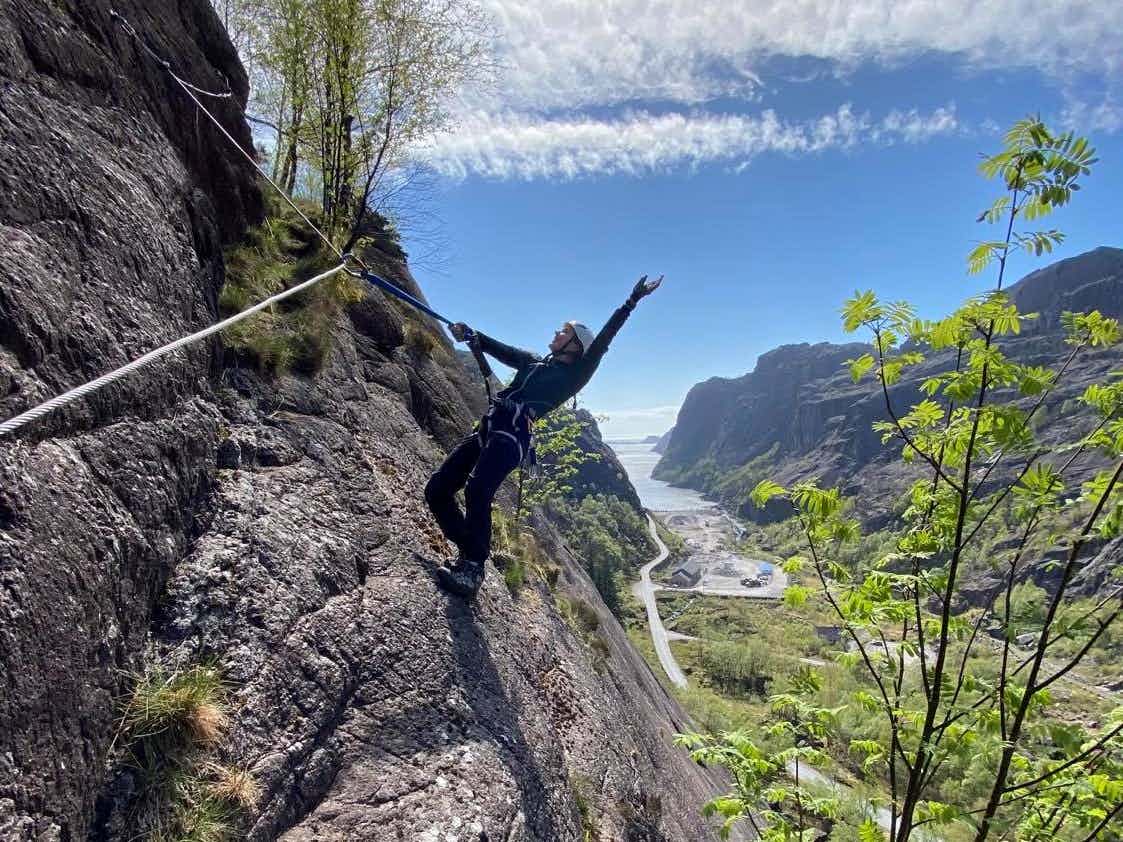Via Ferrata Migaren with a happy climber, view of the Jøssingfjord